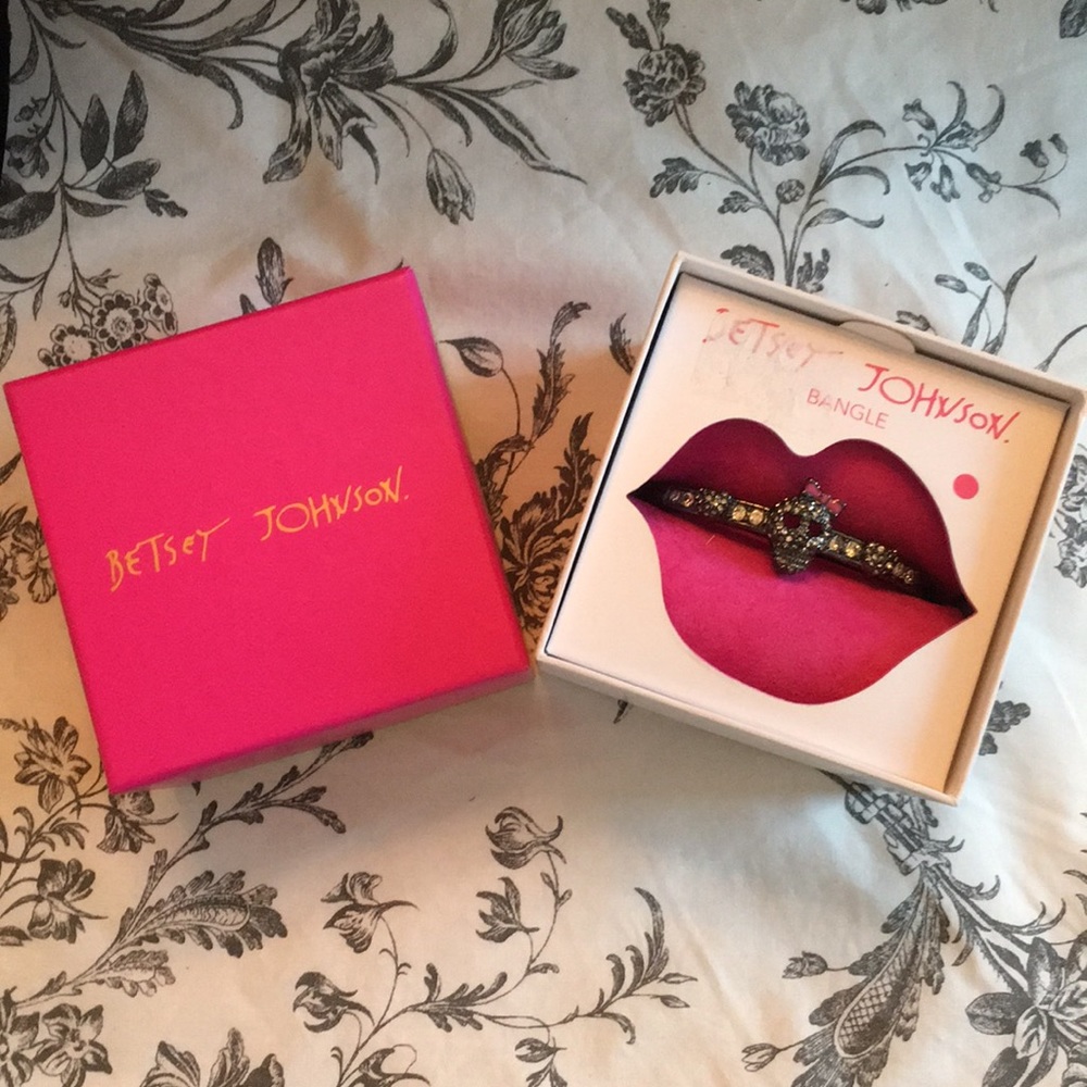 Betsey Johnson Bangle skull with bow bracelet.
